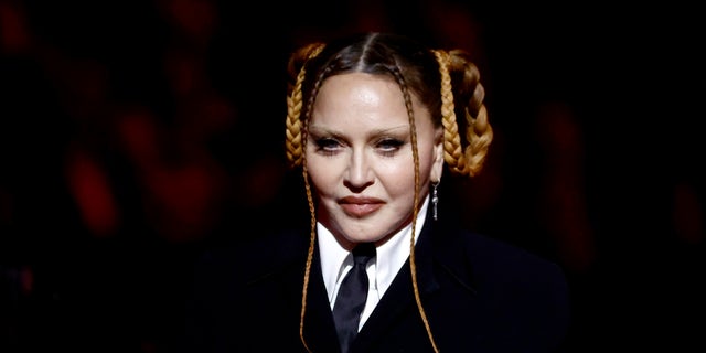 Madonna addresses the plastic surgery rumors that began after her appearance at the 2023 Grammy Awards.