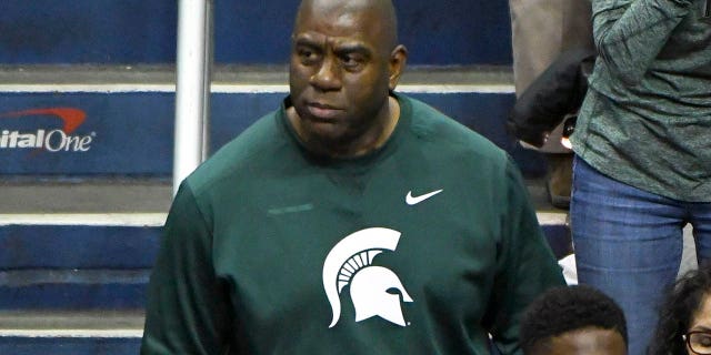 Magic Johnson attends the Elite Eight game between the Michigan State Spartans and the Duke Blue Devils on March 31, 2019, at the Capital One Arena in Washington, D.C.