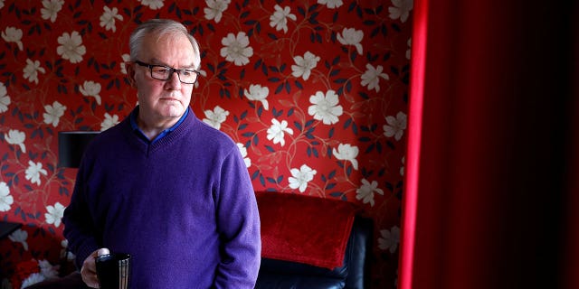Garry Cogan, who suffered a major heart attack in April 2021, is still waiting for a triple heart bypass operation. He is seen at his home in Colchester, Britain, on Jan. 26, 2023.