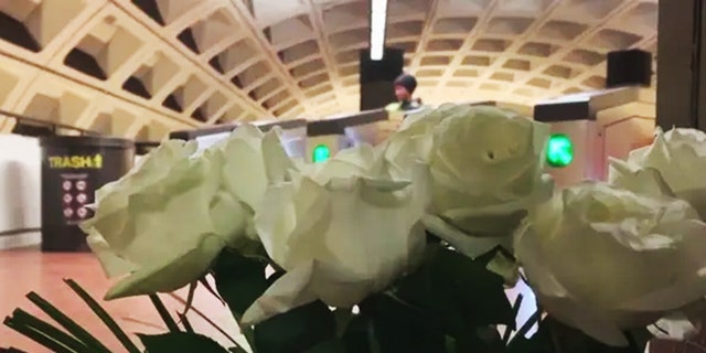 Flowers lie at the Potomac Avenue Metro station in Washington, D.C., after 64-year-old Robert Cunningham was killed trying to stop an active shooter.