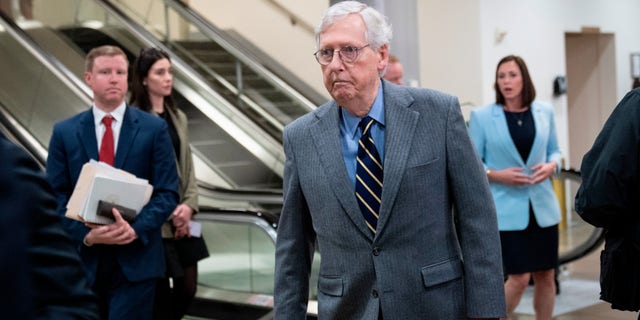 Senate Minority Leader Mitch McConnell, R-Ky., walks to a closed-door briefing for Senators about the Chinese spy balloon at the U.S. Capitol, Feb. 9, 2023, in Washington, D.C.