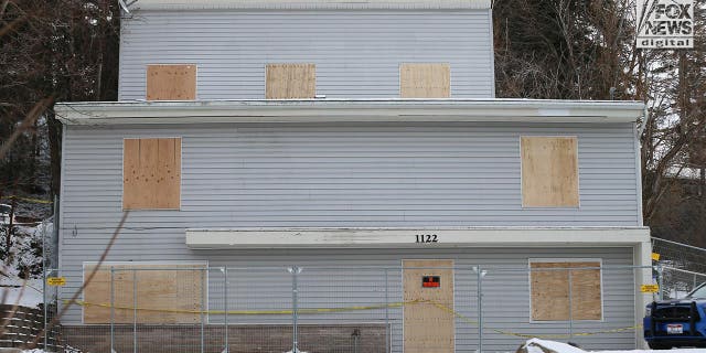 Exterior view of the home where the slaying of four University of Idaho students occurred is boarded up on Feb. 23, 2023.