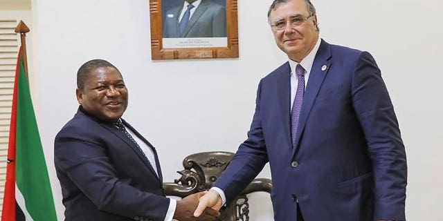 Mozambican President Filipe Nyusi shakes hands with TotalEnergies CEO Patrick Pouyanne. Mozambique has become a hotbed for Islamic insurgents, some of whom killed a Médecins Sans Frontières representative after the NGO inspected the humanitarian situation in their region.