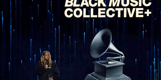 Lil Wayne accepts the Recording Academy global impact award at the Black Music Collective on Feb. 2, 2023, in Los Angeles, California.