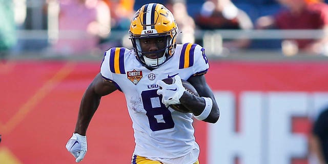 LSU Tigers wide receiver Malik Nabers runs for a touchdown against the Purdue Boilermakers during the second half of the Cheez-It Citrus Bowl Jan. 2, 2023, at Camping World Stadium in Orlando, Fla.