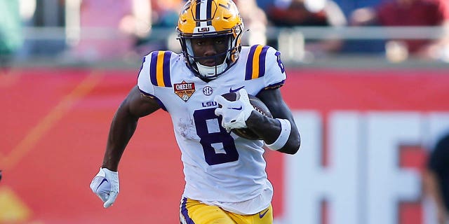 LSU Tigers wide receiver Malik Nabers runs for a touchdown against the Purdue Boilermakers during the second half of the Cheez-It Citrus Bowl Jan. 2, 2023, at Camping World Stadium in Orlando, Fla.