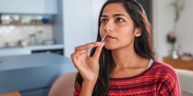The FDA has authorized the first at-home test that can detect both influenza A and B as well as SARS-CoV-2, the virus that causes COVID-19.