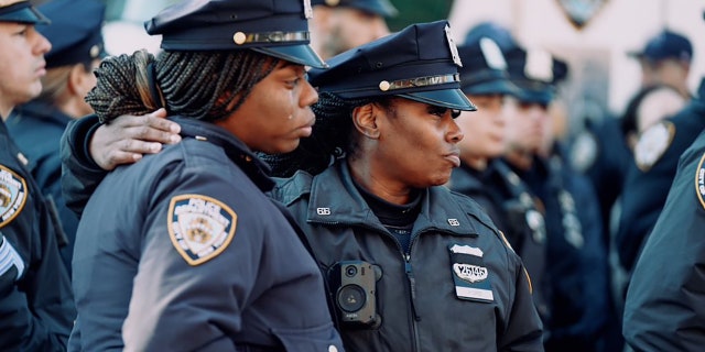 NYPD officers gathered outside the at the Makki Masjid Muslim Community Center in Brooklyn to pay their final respects to the fallen 26-year-old officer Ayeed Fayaz in February.