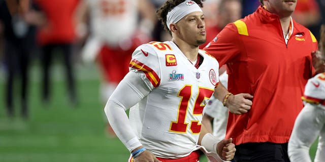 Patrick Mahomes #15 of the Kansas City Chiefs runs off the field at halftime against the Philadelphia Eagles in Super Bowl LVII at State Farm Stadium on February 12, 2023 in Glendale, Arizona. 