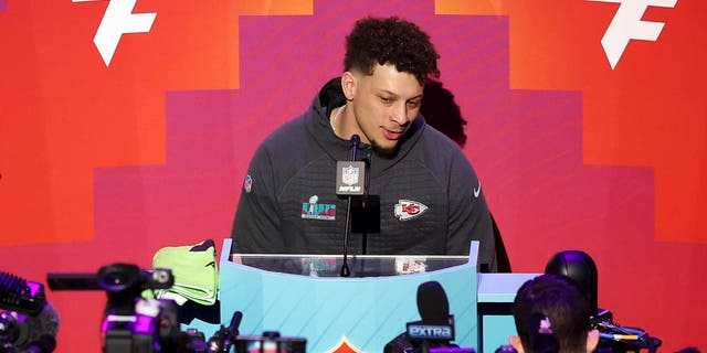 Patrick Mahomes #15 of the Kansas City Chiefs speaks to the media during Super Bowl LVII Opening Night presented by Fast Twitch at Footprint Center on February 06, 2023, in Phoenix, Arizona.