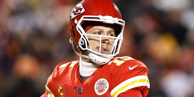 Patrick Mahomes #15 of the Kansas City Chiefs passes the ball during the AFC Championship NFL football game between the Kansas City Chiefs and the Cincinnati Bengals at GEHA Field at Arrowhead Stadium on January 29, 2023 in Kansas City, Missouri.