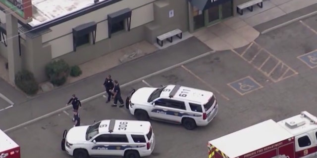 The drive-by shooting happened Friday in a parking lot near 1st Avenue and Thomas Road in Phoenix.