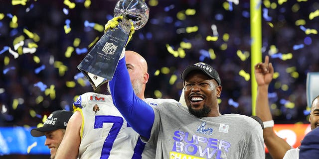 Von Miller of the Los Angeles Rams hoists the Vince Lombardi Trophy after Super Bowl LVI at SoFi Stadium Feb. 13, 2022, in Inglewood, Calif. The Los Angeles Rams defeated the Cincinnati Bengals 23-20.  