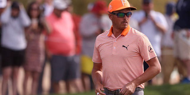 Rickie Fowler's shot from 216 yards took three hops before settling and rolling to the bottom of the cup;  it was his third ace as a professional.