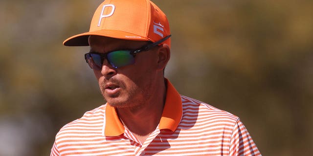 Rickie Fowler drives across the sixth green at TPC Scottsdale on February 12, 2023.