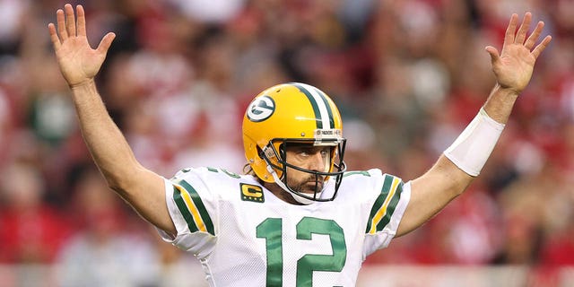 Aaron Rodgers of the Green Bay Packers celebrates after a touchdown during a game against the San Francisco 49ers at Levi's Stadium in Santa Clara, California, on Sept. 26, 2021.