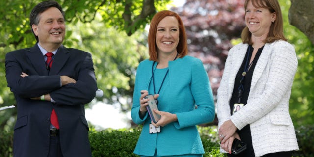 From left: Former White House chief of staff Ron Klain, former White House press secretary Jen Psaki and now-exiting White House communications director Kate Bedingfield wait for President Biden to deliver remarks on the COVID-19 response and vaccination program in the Rose Garden of the White House in Washington, D.C., on May 13, 2021.
