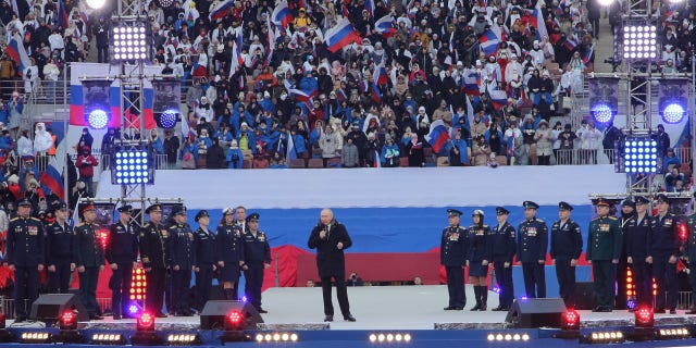 Thousands of people gather at a Moscow stadium for a pro-Putin rally marking Defender of the Fatherland Day as well as the first anniversary of Russia's military invasion of Ukraine.