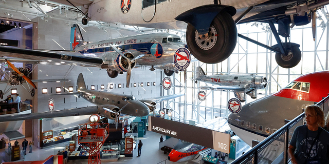 Patrons visit the Smithsonian's National Air and Space Museum for the public reopening of the museum’s west end galleries on the National Mall in Washington, U.S. October 14, 2022. 