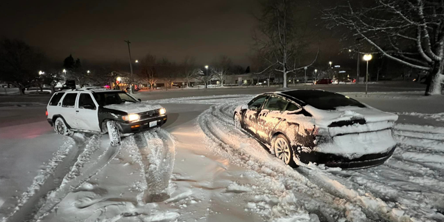 Cars are trapped on an icy road in Portland, Oregon.