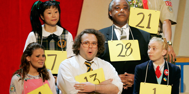 The Reverend Al Sharpton, top right, performs with the cast of the hit musical "The 25th Annual Putnam County Spelling Bee" during a performance of a number by the cast at the American Theatre Wing's 59th Annual Tony Awards at Radio City Music Hall in New York, June 5, 2005.