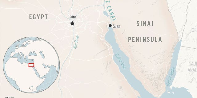 A map shows the Suez Canal and the Sinai Peninsula in Egypt.