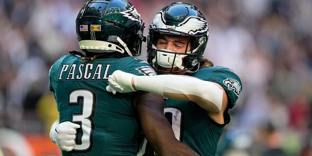 Philadelphia Eagles wide receiver Zach Pascal (3) hugs tight end Jack Stoll before the NFL Super Bowl LVII football game between the Kansas City Chiefs and the Philadelphia Eagles on Sunday, February 12, 2023, in Glendale, Arizona. 