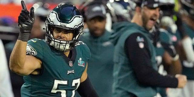 Philadelphia Eagles linebacker T.J. Edwards (57) celebrates next to head coach Nick Sirianni, right, after tackling Kansas City Chiefs quarterback Patrick Mahomes during the first half of the NFL Super Bowl LVII football game, Sunday, Feb. 12, 2023, in Glendale, Ariz. 