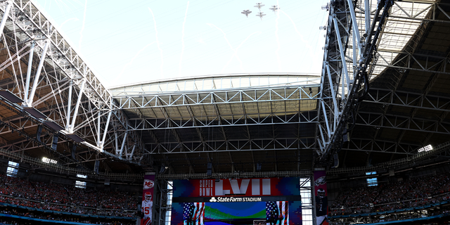 Navy pilots perform a flyover before Super Bowl LVII between the Kansas City Chiefs and the Philadelphia Eagles at State Farm Stadium on Feb. 12, 2023, in Glendale, Arizona.