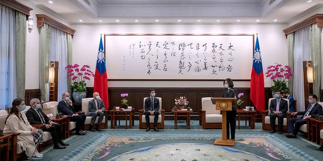 Taiwan President Tsai Ing-wen, center right, speaks during a meeting with Swiss lawmakers in Taipei, Taiwan, February 6, 2023. 