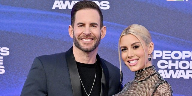 Tarek El Moussa and Heather Rae Young smiling