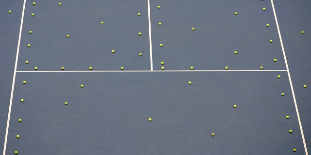 Tennis balls are seen during a practice session ahead of the Beijing 2008 Olympic Games August 6, 2008.