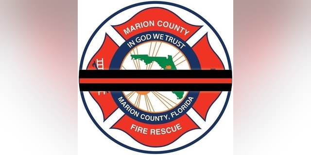 Marion County Fire Rescue posted an updated photo of its cross with a thin black and red line through the logo, signifying the loss of a member.