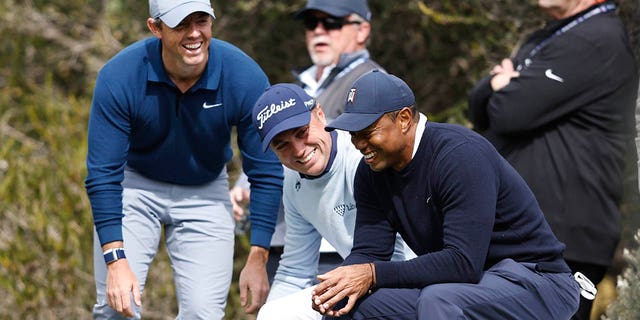 (L-R) Rory McIlroy of Northern Ireland, Justin Thomas of the United States and Tiger Woods of the United States meet on the fourth tee during the first round of the Genesis Invitational at the Riviera Country Club on February 16, 2023 in Pacific Palisades , California .