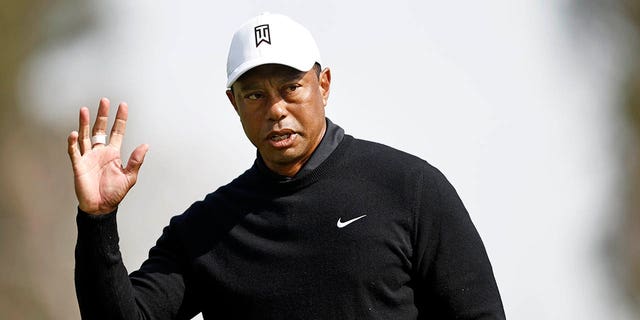 Tiger Woods reacts to his putt on the fourth green during the second round of the Genesis Invitational at Riviera Country Club in Pacific Palisades, California, on Friday.