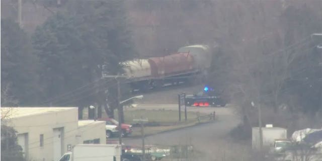 Authorities respond to a train derailment in Van Buren Township in Detroit.