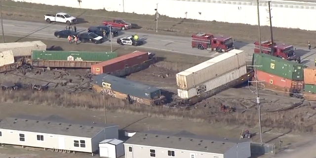 At least 16 rail cars went off the tracks when the train collided with an 18-wheeler on Monday morning.