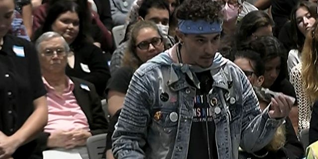 Trans activist Lindsey Spero injects testosterone in protest.