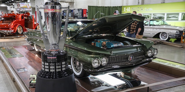 The names of both cars will be added to the Grand National Roadster Show's trophies.