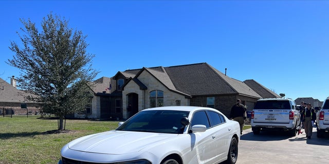 Detectives from the Chambers County Sheriff's Office investigating the murder of Joseph Hartsfield. 