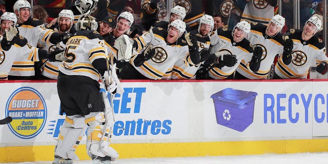 Linus Ullmark #35 of the Boston Bruins scores a goalie goal on a pulled net during the final seconds of their NHL game against the Vancouver Canucks at Rogers Arena February 25, 2023, in Vancouver, British Columbia, Canada. The Boston Bruins win 3-1.   