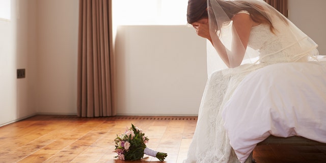 bride crying at wedding
