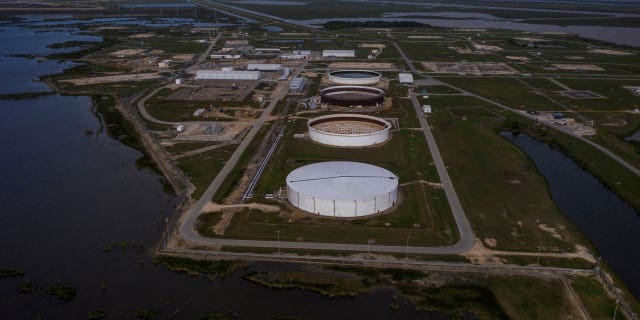 Oil prices settled at lower rates Thursday, as the U.S. dollar also saw a higher degree of strength.