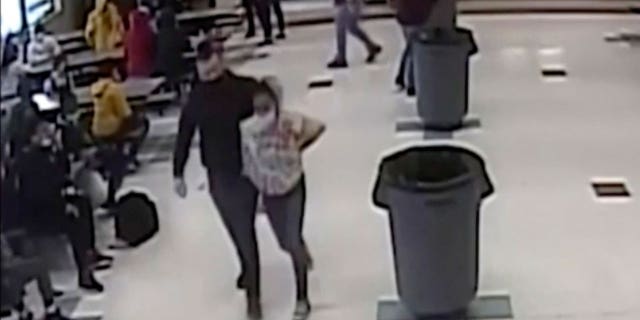 An Illinois man is suing a Wisconsin school district over an incident in which an off-duty police officer used a neck restraint on his daughter.