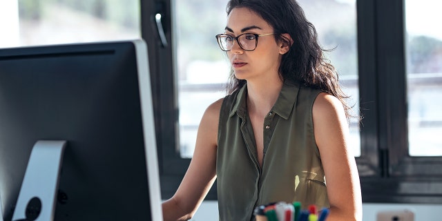 woman working on computer