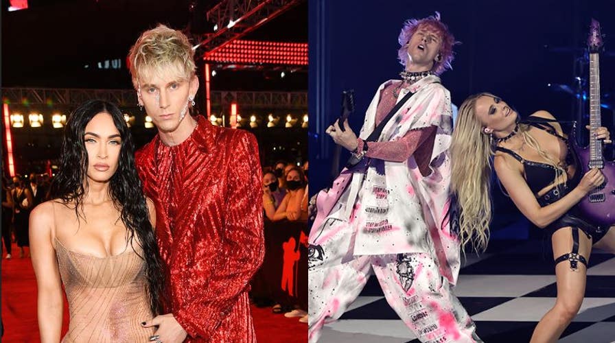 Machine Gun Kelly and Megan Fox walk the Grammy Awards red carpet together