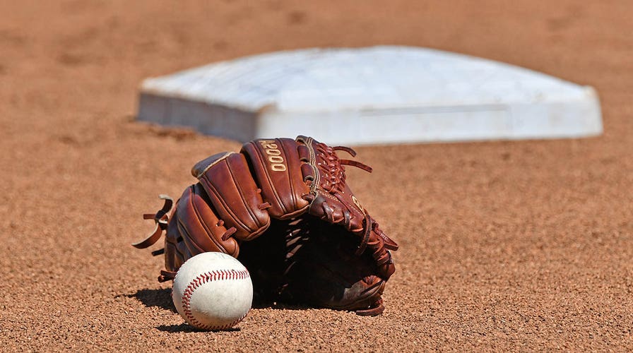 College baseball game ends on obvious ball after player argues