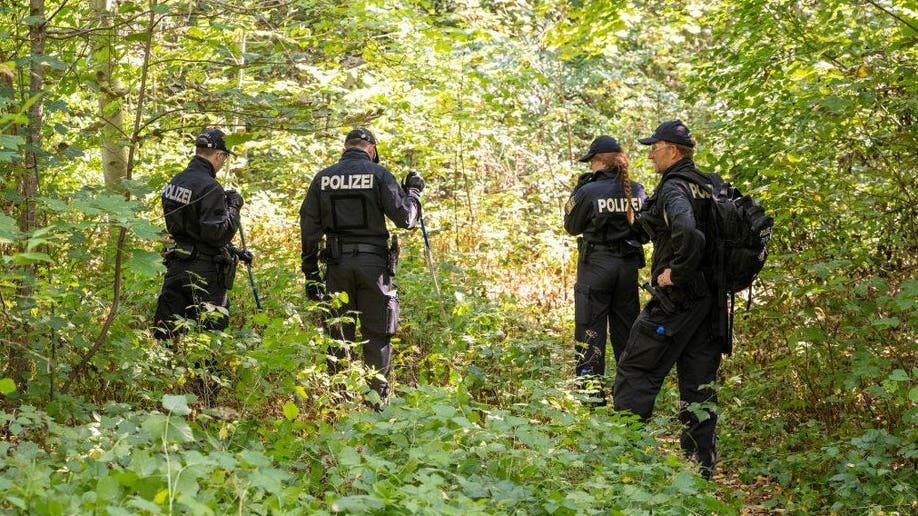 German police search the woods
