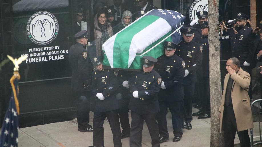 Flag-draped coffin