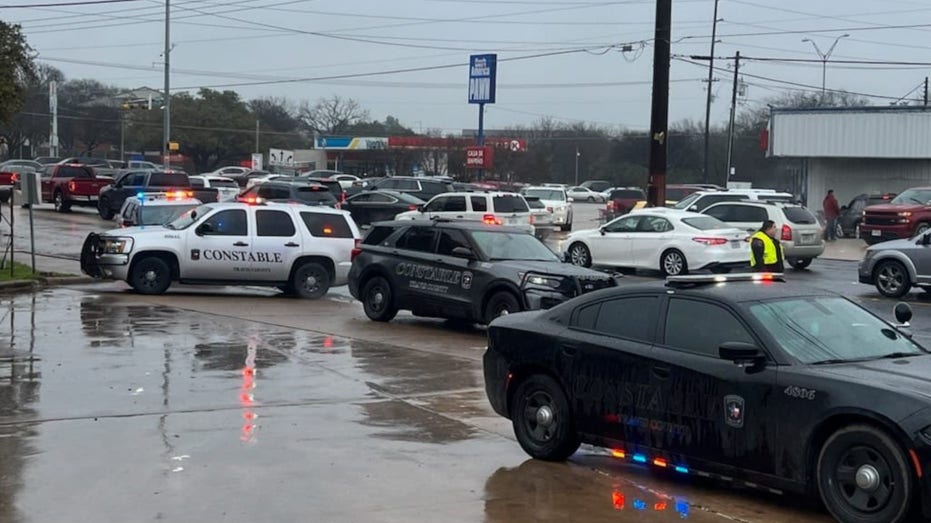 Gridlocked traffic at the H-E-B store parking lot